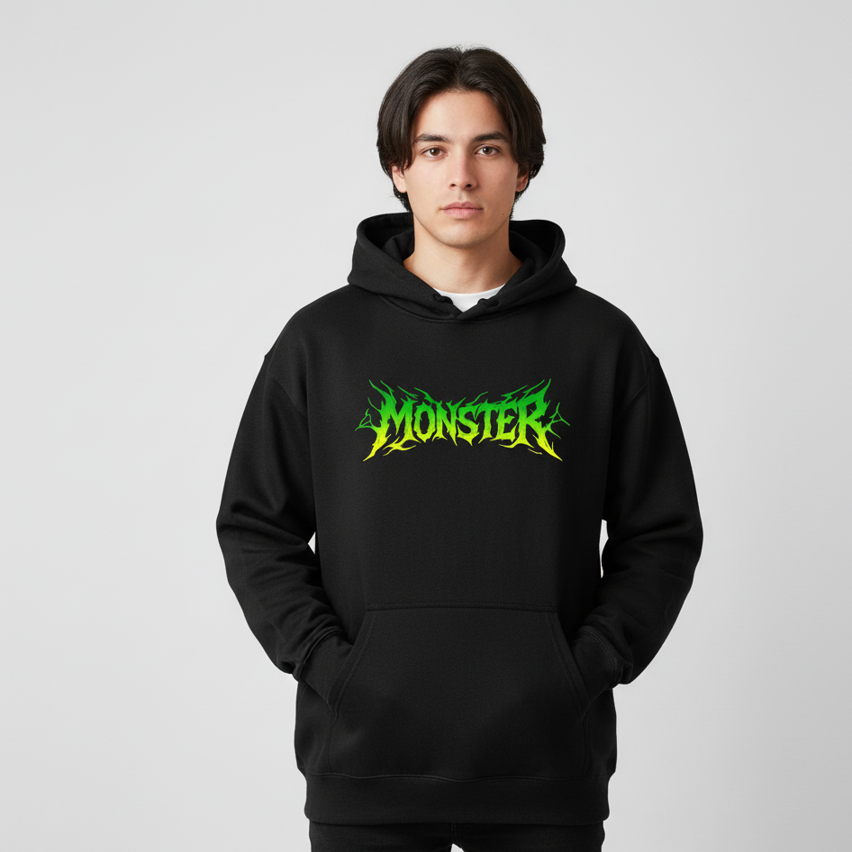 Person wearing a black hoodie with 'Monster' text in green and yellow on a gray background